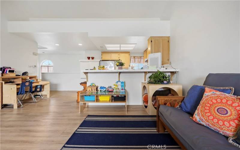 Oversized living space facing the kitchen in the back. Huge windows let in lots of natural sunlight