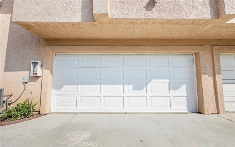 Two car attached garage with ample storage.