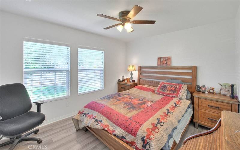 Fourth/Front Bedroom with Two Windows and Ceiling Fan!