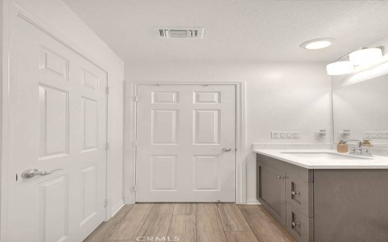 Secondary Bath with Creamy, Upgraded Quartz Counters and Upgraded Faucet!