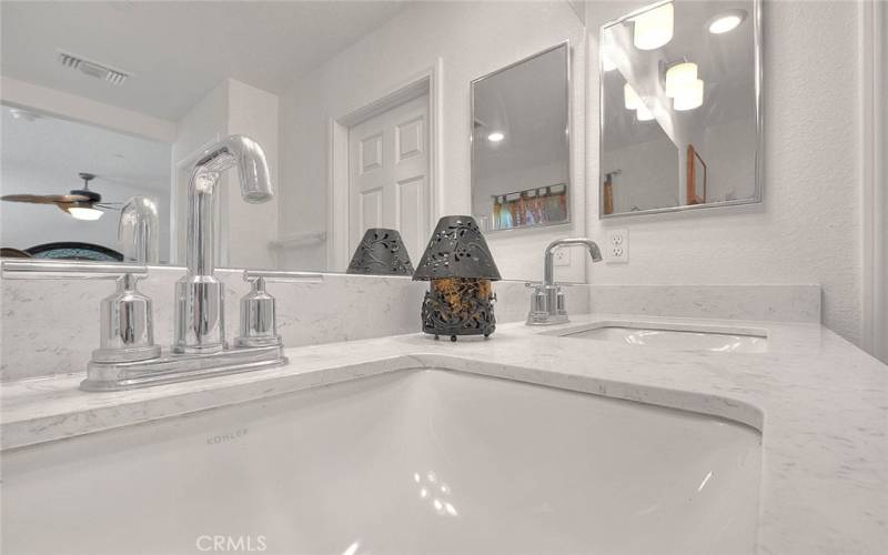 Secondary Bath with Creamy, Upgraded Quartz Counters and Upgraded Faucet!