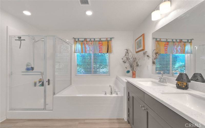 Primary Bath with Separate Shower and Tub, Dual Sinks and Private Water Closet.