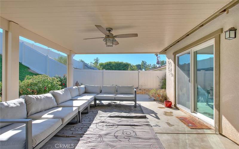 Welcome to your Backyard Haven with Alumawood Patio, Ceiling Fan and Privacy!