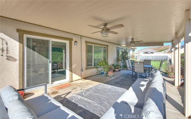 Welcome to your Backyard Haven with Alumawood Patio, Ceiling Fan and Privacy!