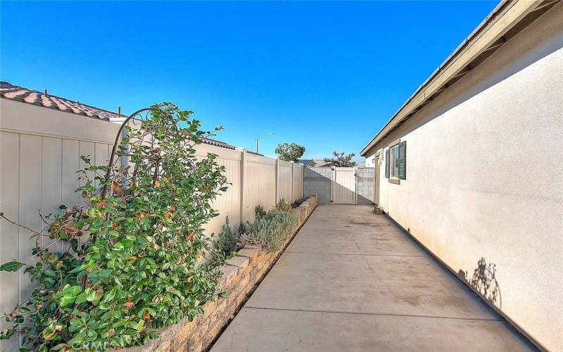 Side Yard with Vinyl Fencing.