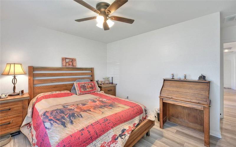 Fourth/Front Bedroom with Two Windows and Ceiling Fan!