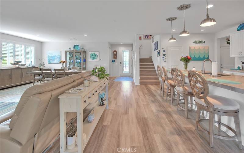 Preview 7 of 31 - Nice shot of the walkway between the Living Room and Center Island in the Kitchen