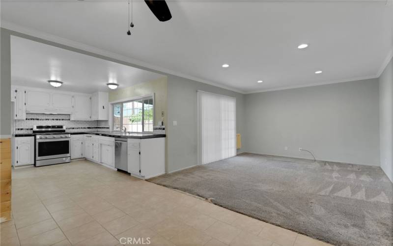 Kitchen is adjacent to dining area & family room