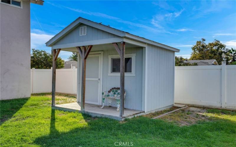 additional storage shed in backyard