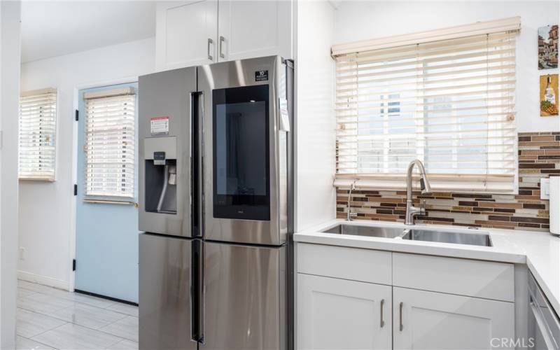 Kitchen with samsung Smart 4-door Refrigerator