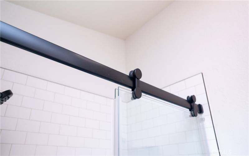 Shower door hardware