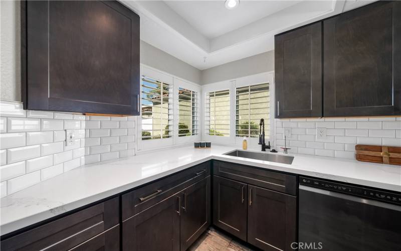 Remodeled kitchen with quartz countertops