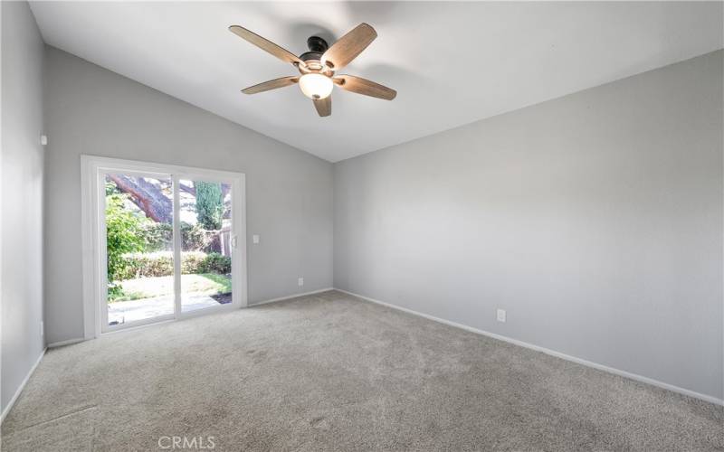 Primary bedroom w/ high ceiling