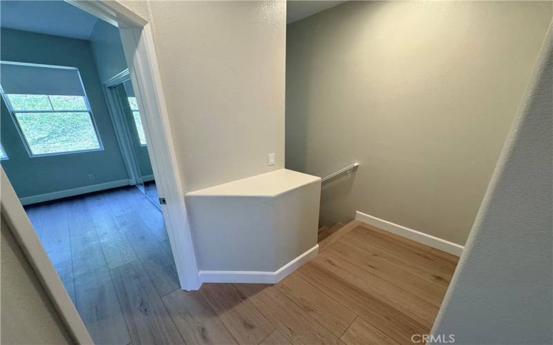 There is a laundry closet at the top of the stairs with washer and dryer