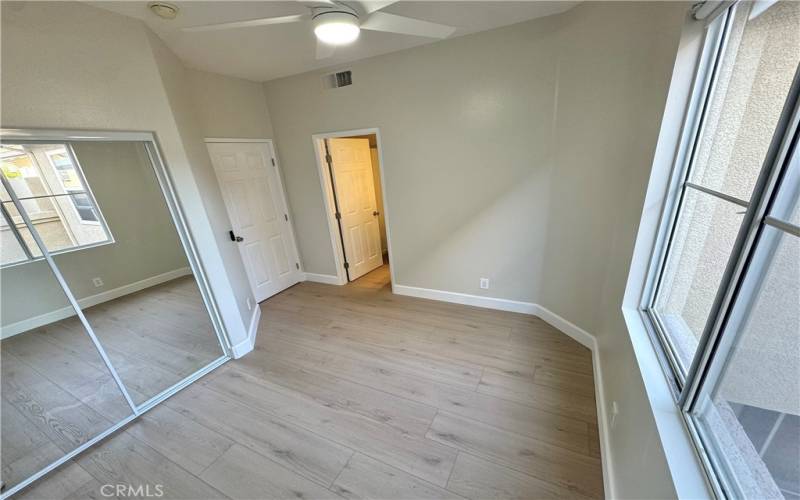 Second bedroom with its own bathroom new floors and doors and window blind