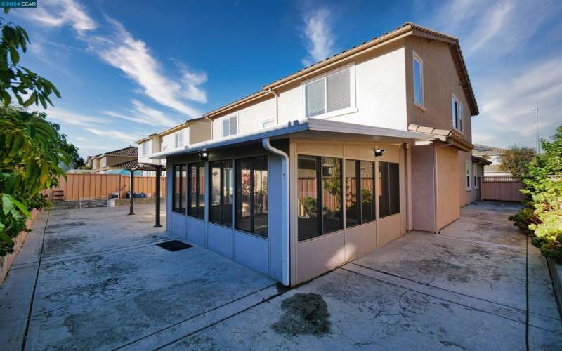 View of Sunroom and Sideyard