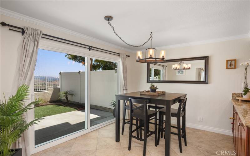 Dining Room off Kitchen with Views and Sliding Glass Doors Access to Yard