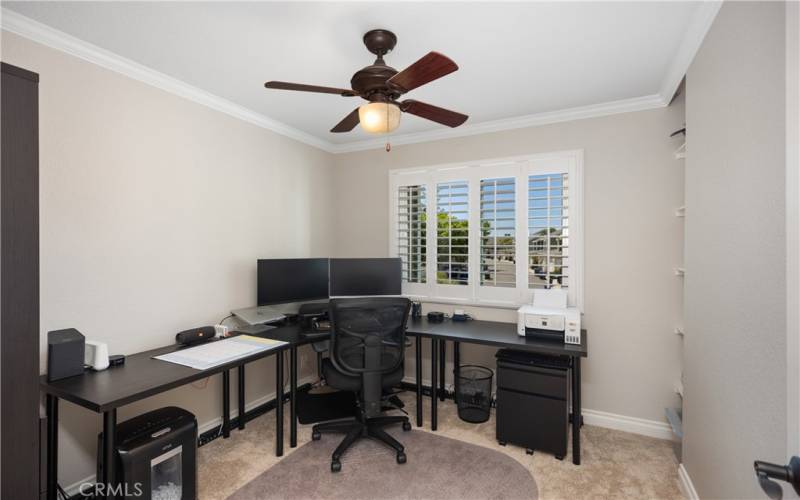 Upstairs Bedroom #2 with Plantation Shutters and Ceiling Fan