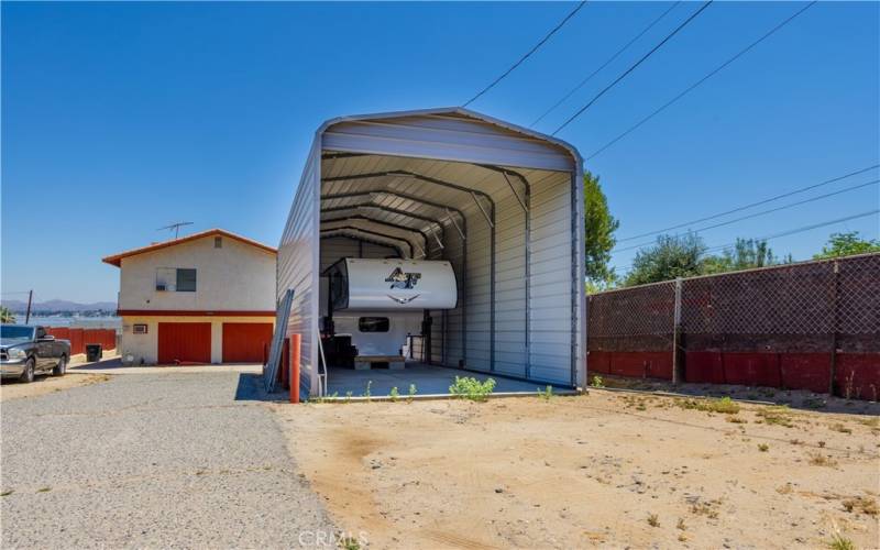 One of two carports, this one large enough for 5th wheel or full sized RV.