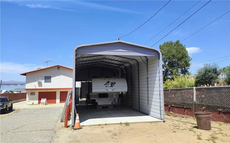 R.V. covered parking with room for R.V. and boat.