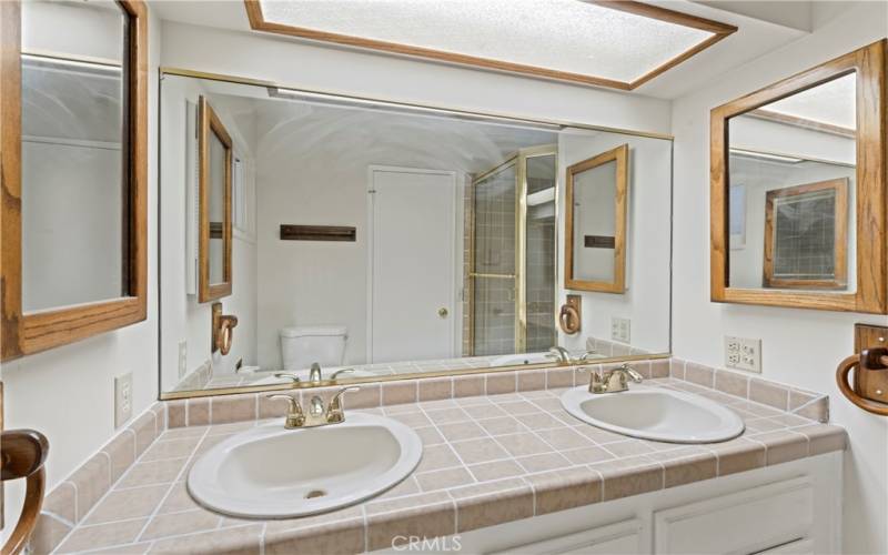 The primary en suite features double sinks.