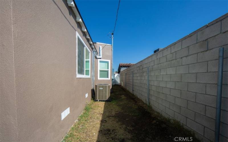 North side walk way with central air conditioner