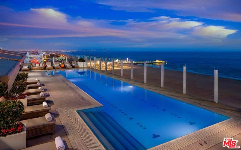 Rooftop Pool at Night with views of the Santa Monica Pier