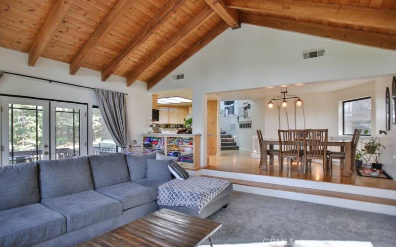 Living room opens to kitchen and dining room