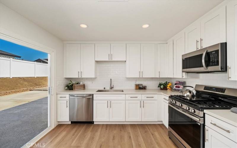 Farmhouse sink with all new appliances.