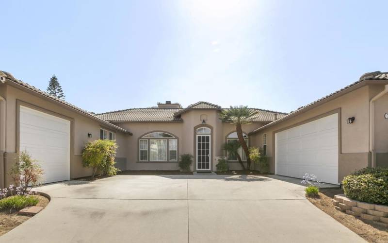 Tucked up against the foothills of North Escondido on a private cul-de-sac street with 3 car garage