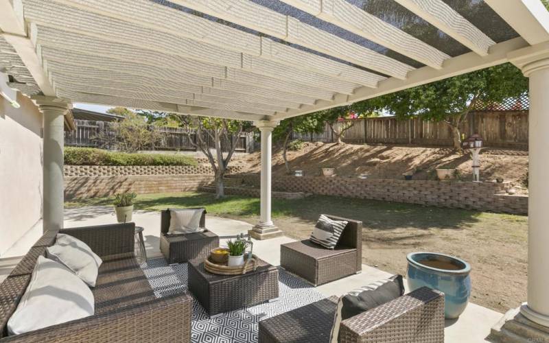 Backyard patio with views of the yard making it perfect for outdoor dining and entertaining