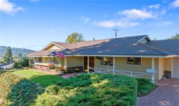 Exquisite home on pine tree-lined street.