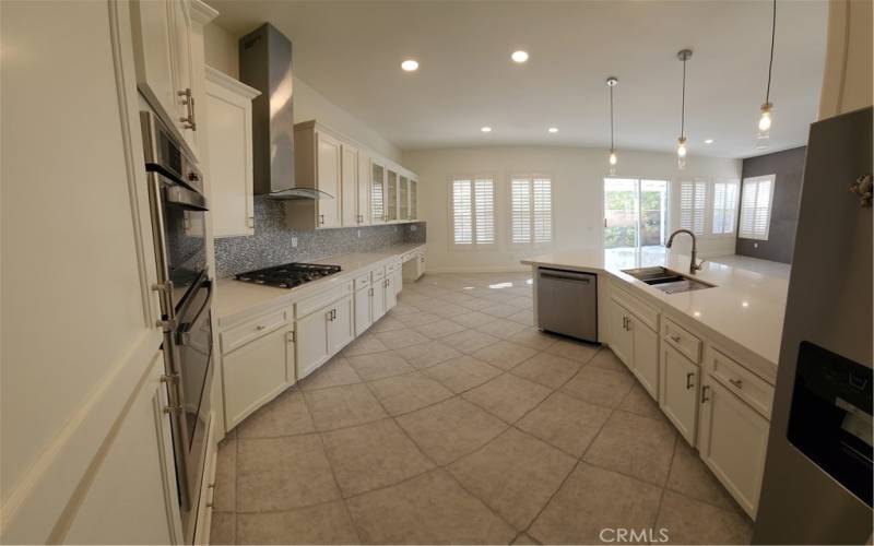 Kitchen has been newly upgraded with Quartz Countertops & new appliances such as oven and microwave combination, gas cooktop, and quiet dishwasher. Refrigerator Included