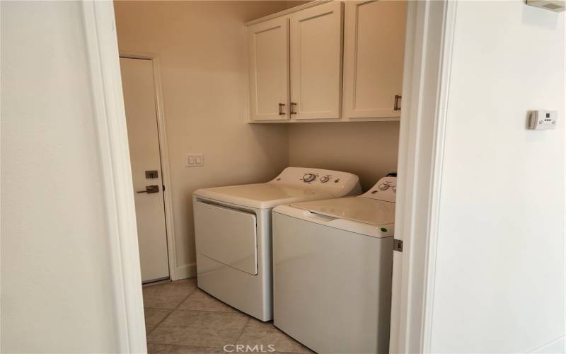 Separate Laundry Room includes Washer and Brand New Dryer