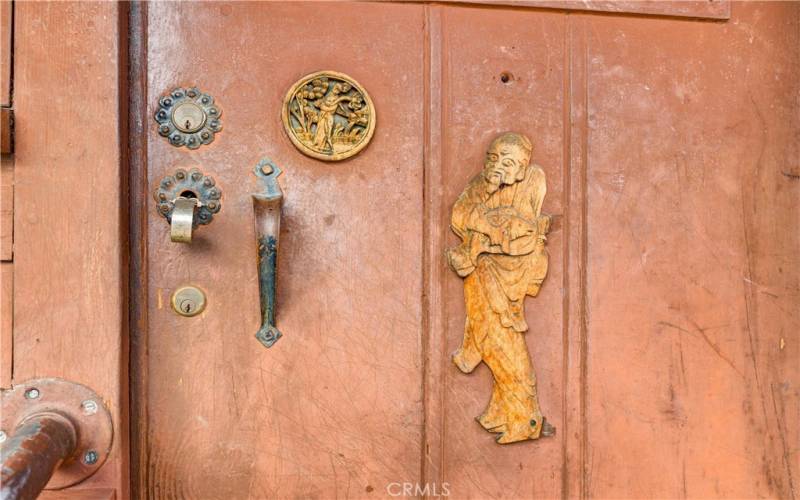 Detailed woodworking on exterior of mudroom door.