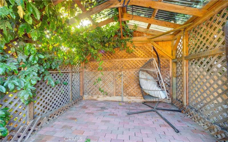 Gazebo area located in backyard.