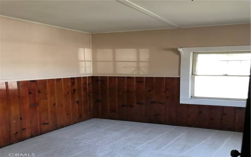 Bedroom by living room.