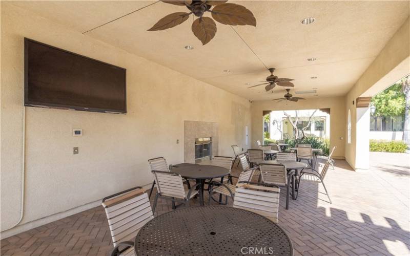 Common area - seating area w/ 2 TV’s, ceiling fans, fireplace