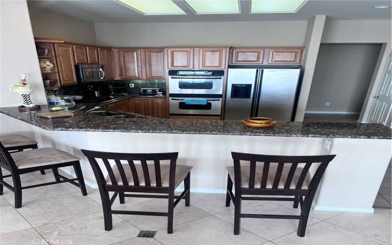 Open Kitchen to casual eating counter top.