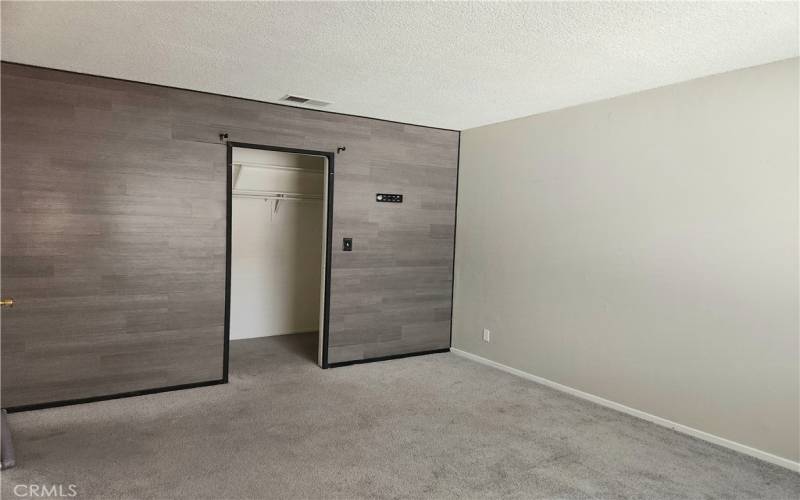 Bedroom 1 with walk in closet.