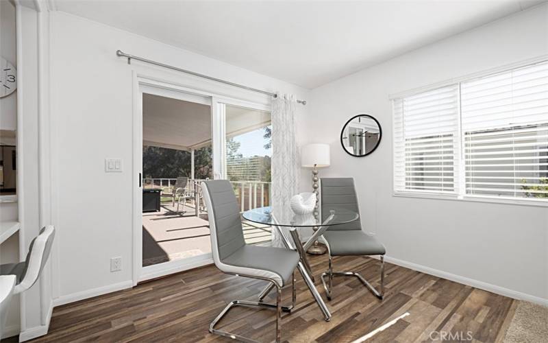 Eating area and sliding glass door leading to front porch