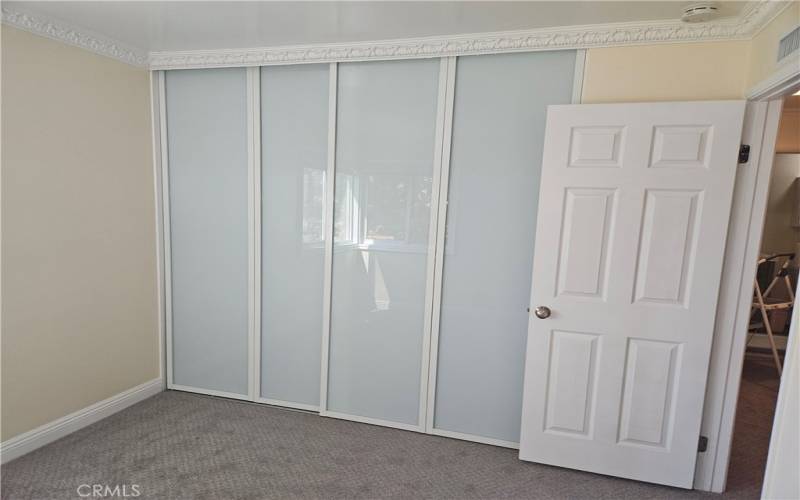 Bed 1 newer carpet and ornate closet doors