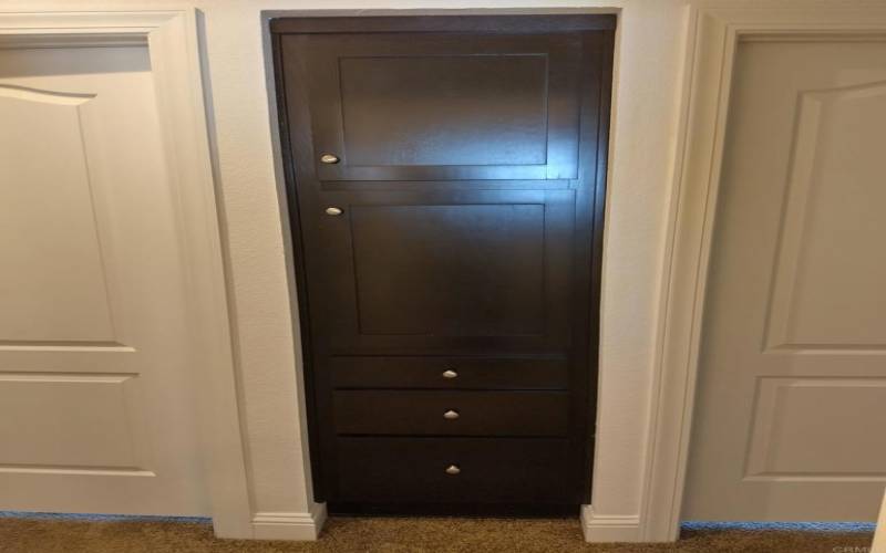 Convenient linen cabinet in central hall