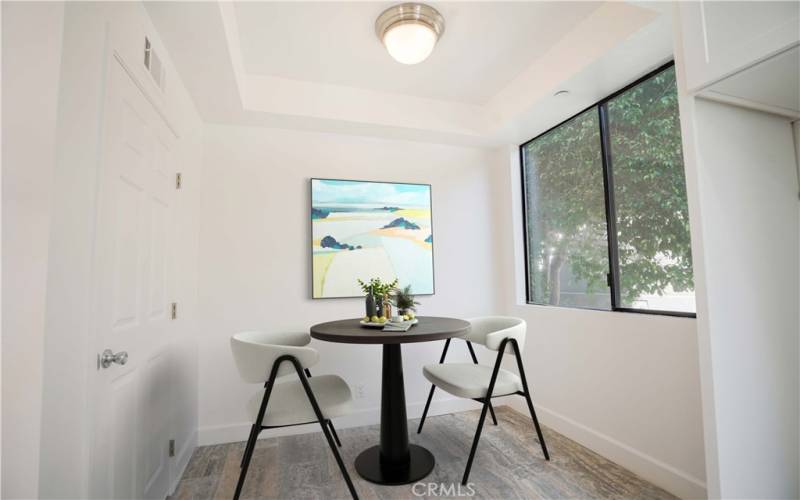 Breakfast nook in dine in kitchen virtually staged