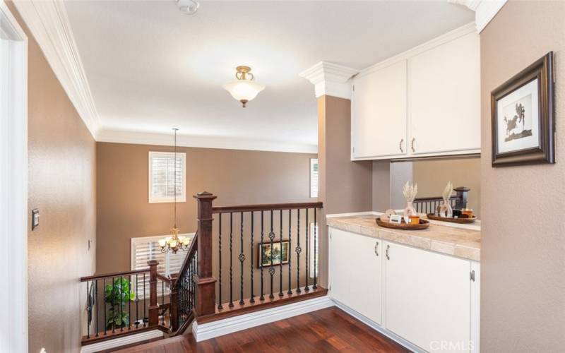 
This home offers convenient storage options with built-in cabinetry located in the upstairs hallway, perfect for organizing essentials.