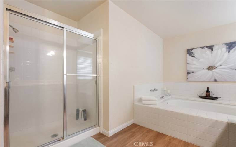 Separate shower and oversized soaking tub to soak your cares away.