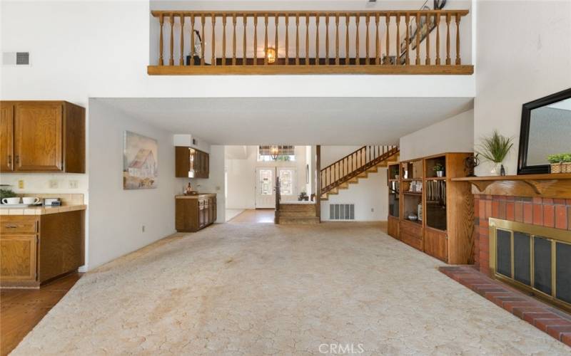 The loft overlooks the family room and kitchen areas.