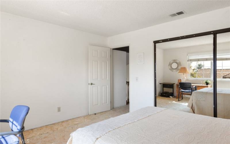 View of the bedroom looking towards the door.