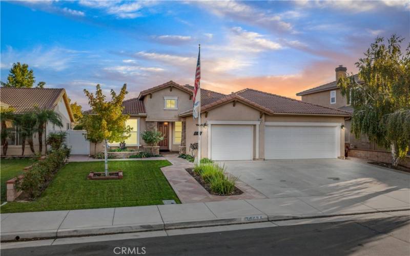 Beautiful curb appeal greets you as you approach this single story home with a 3 car garage.