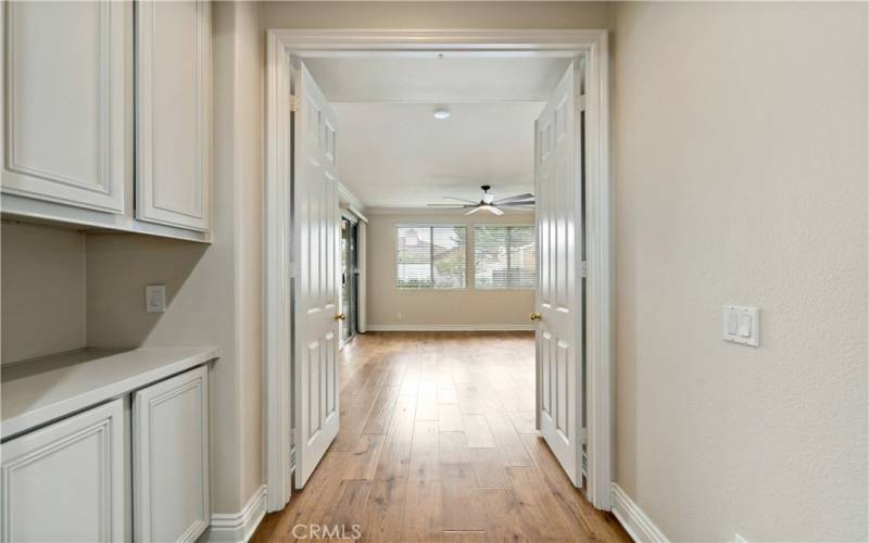 Double door entry into the master bedroom with views of the backyard.